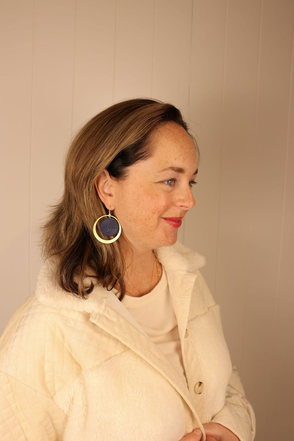 Cecelia earring being worn by model.
