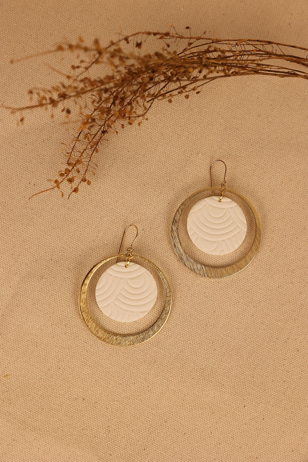 Cecelia earring with white clay and gold hardware.