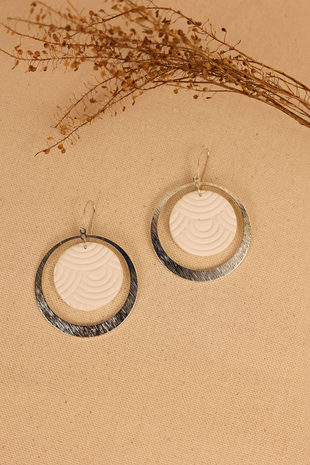 Cecelia Dangle with white clay and silver hardware.