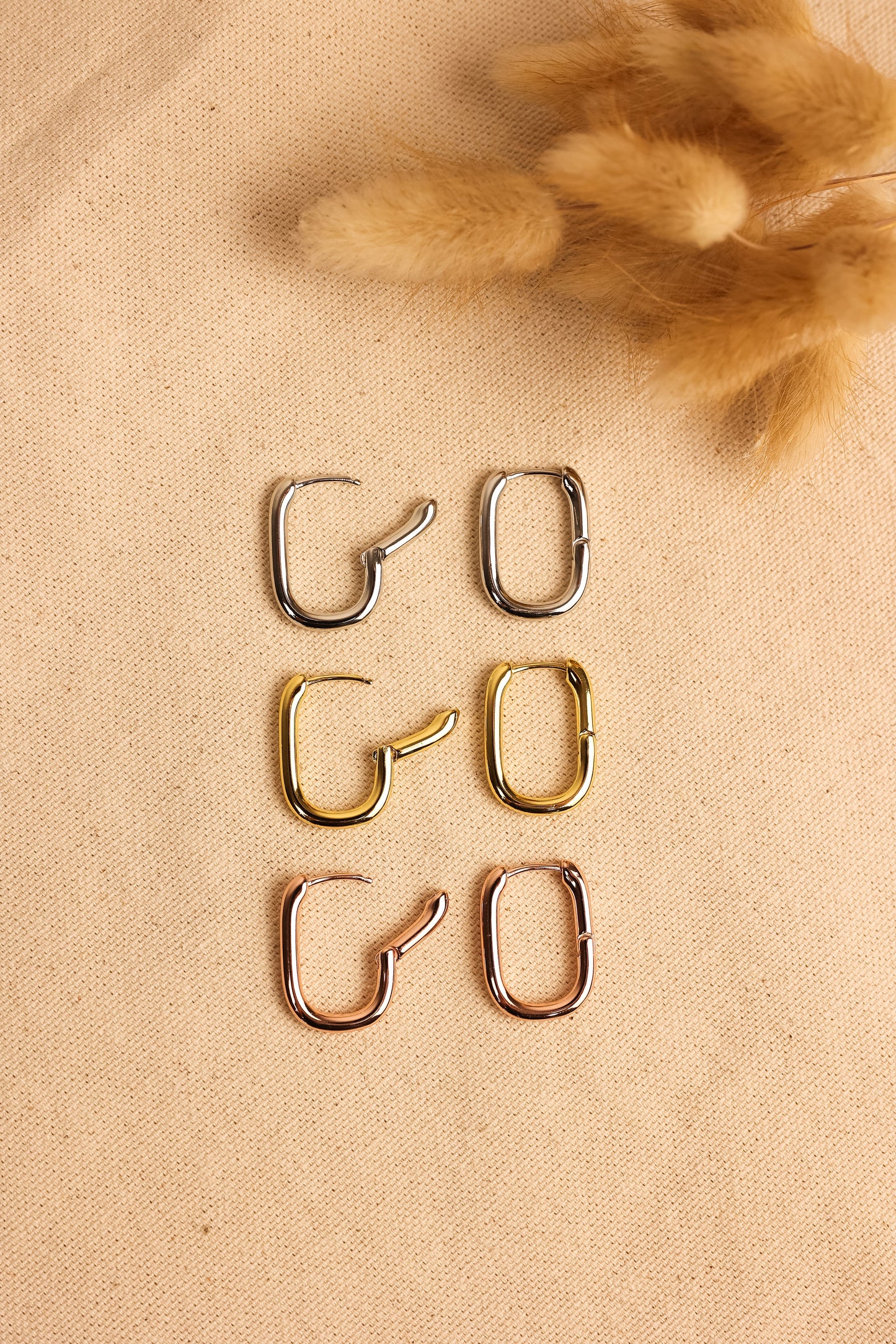geometric hoops in silver, gold, or rose gold.