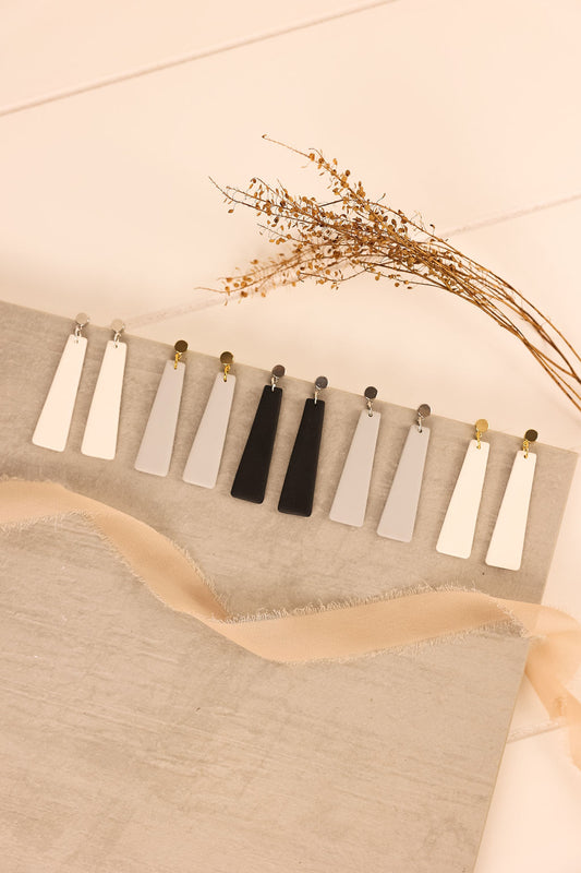 image of a rectangular earring in a variety of colors.