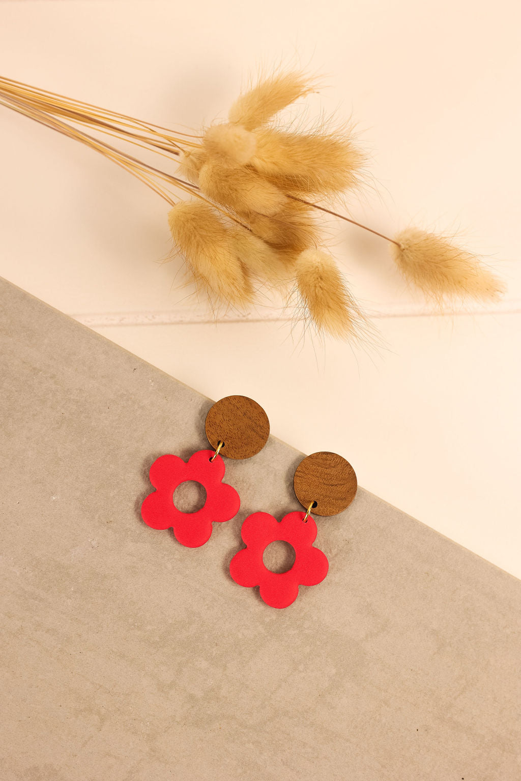 Pink polymer clay retro flower power earring.