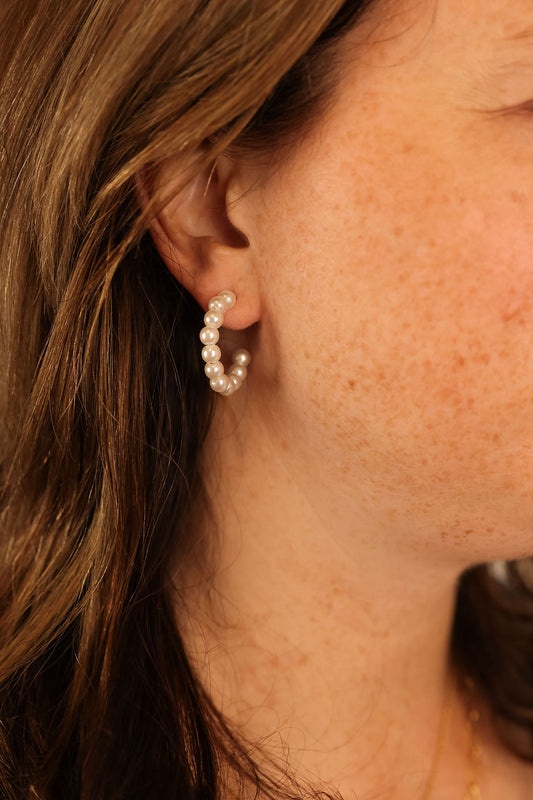 pearl hoop earrings worn by model