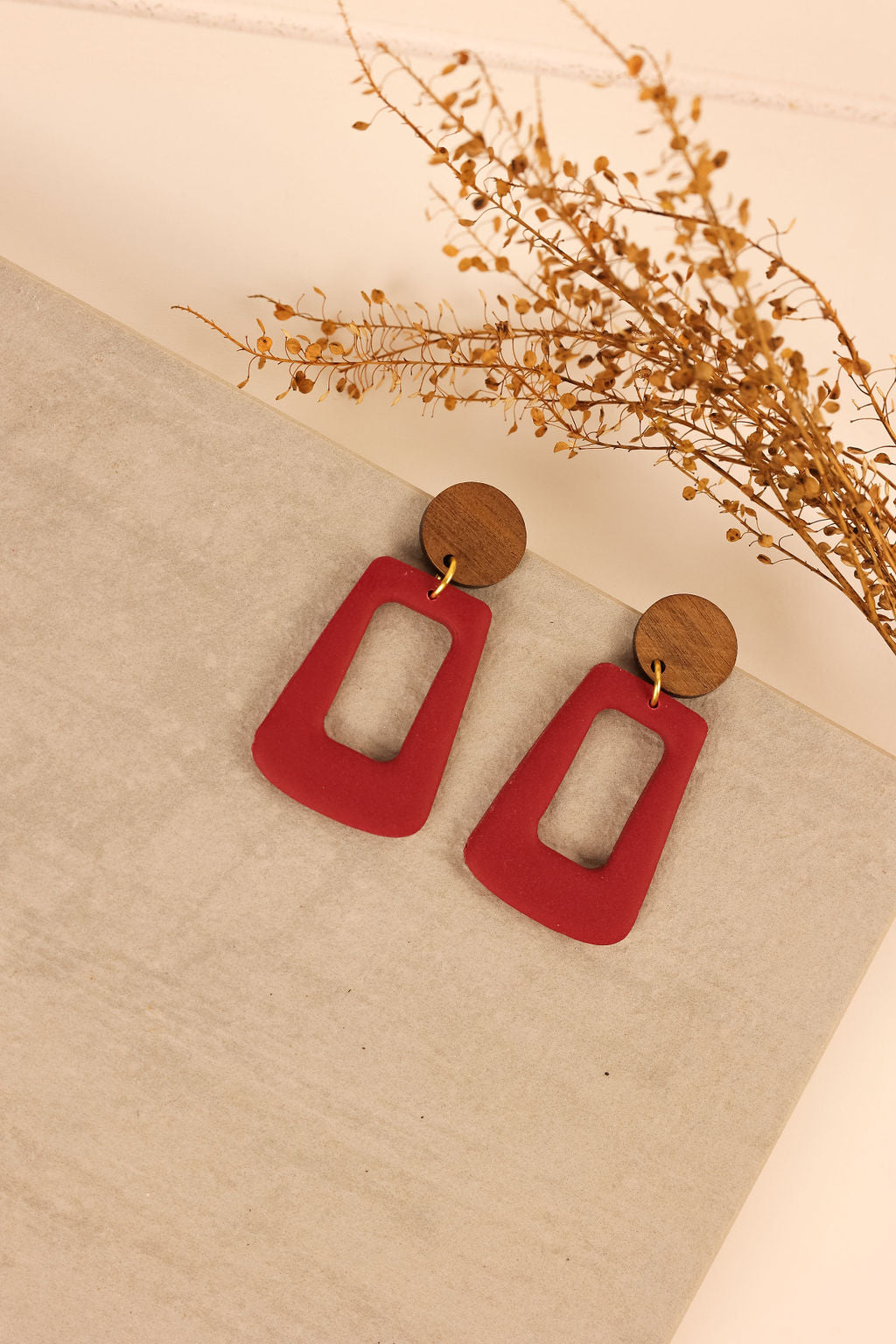 wooden trapezoid earring in wine.