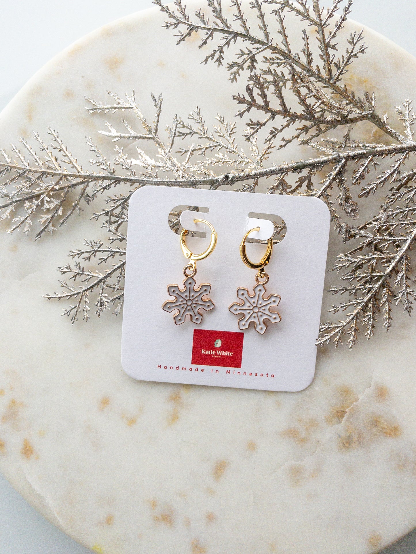 gold charm earring | snowflake