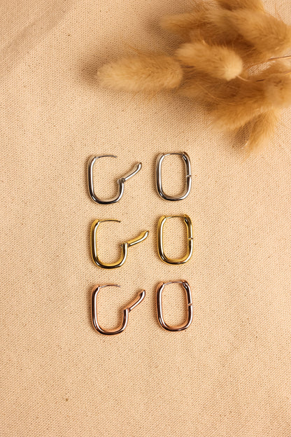 geometric hoops in silver, gold, or rose gold. 