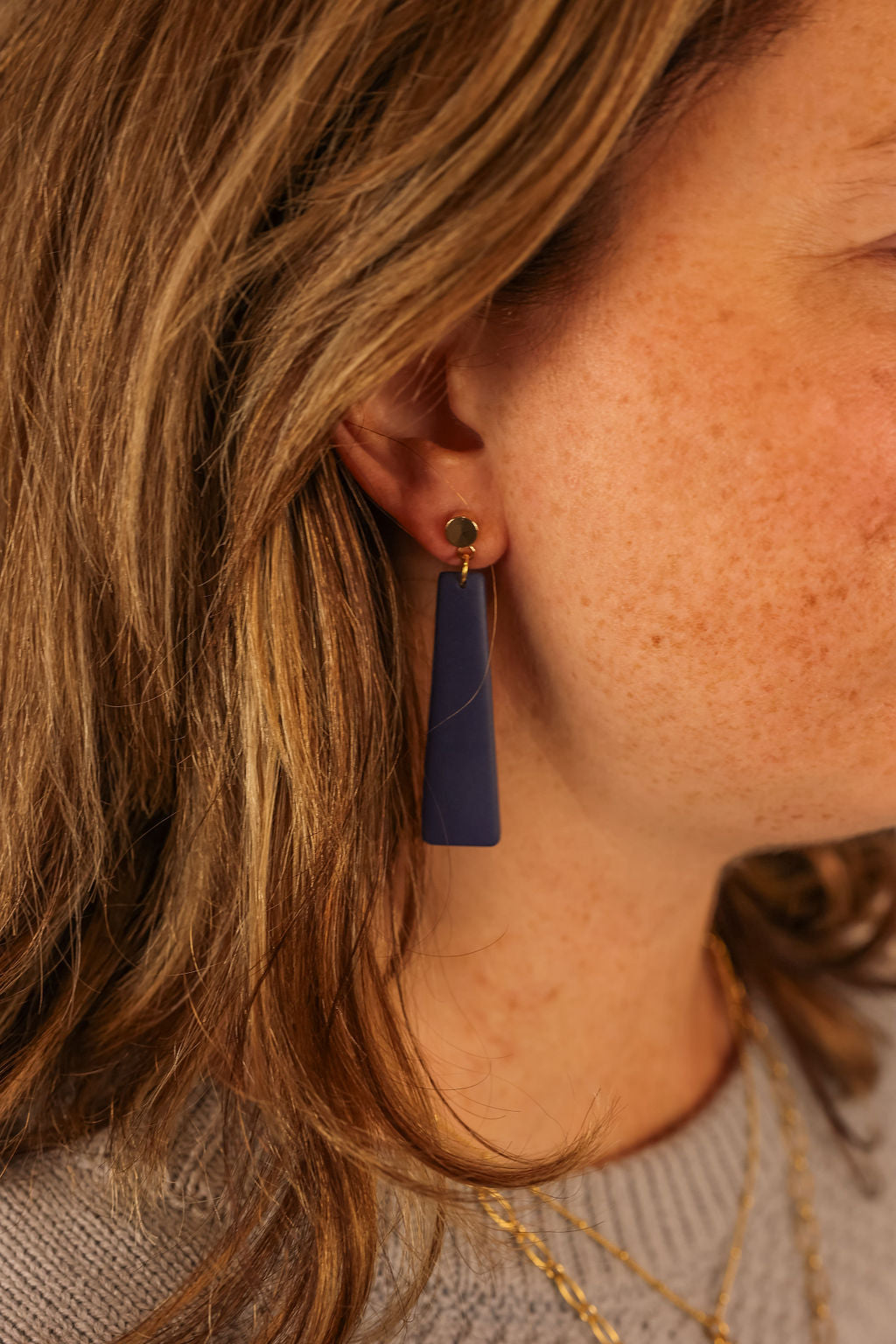 Nora earring being worn by model. 