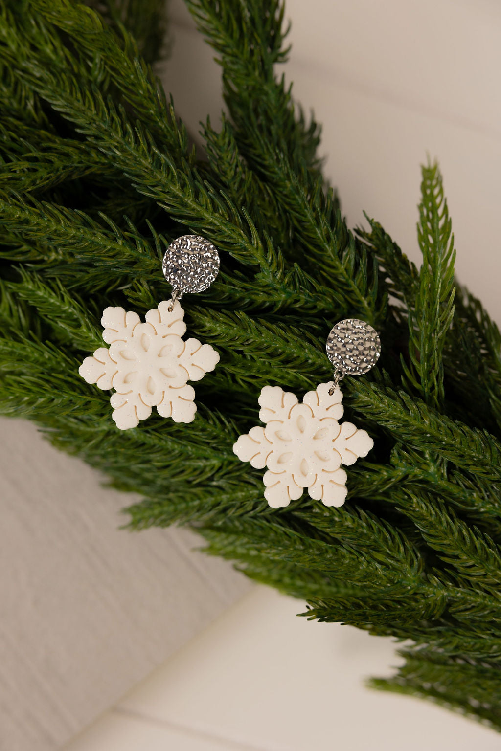 polymer clay snowflake statement earring. Handmade and nickel free