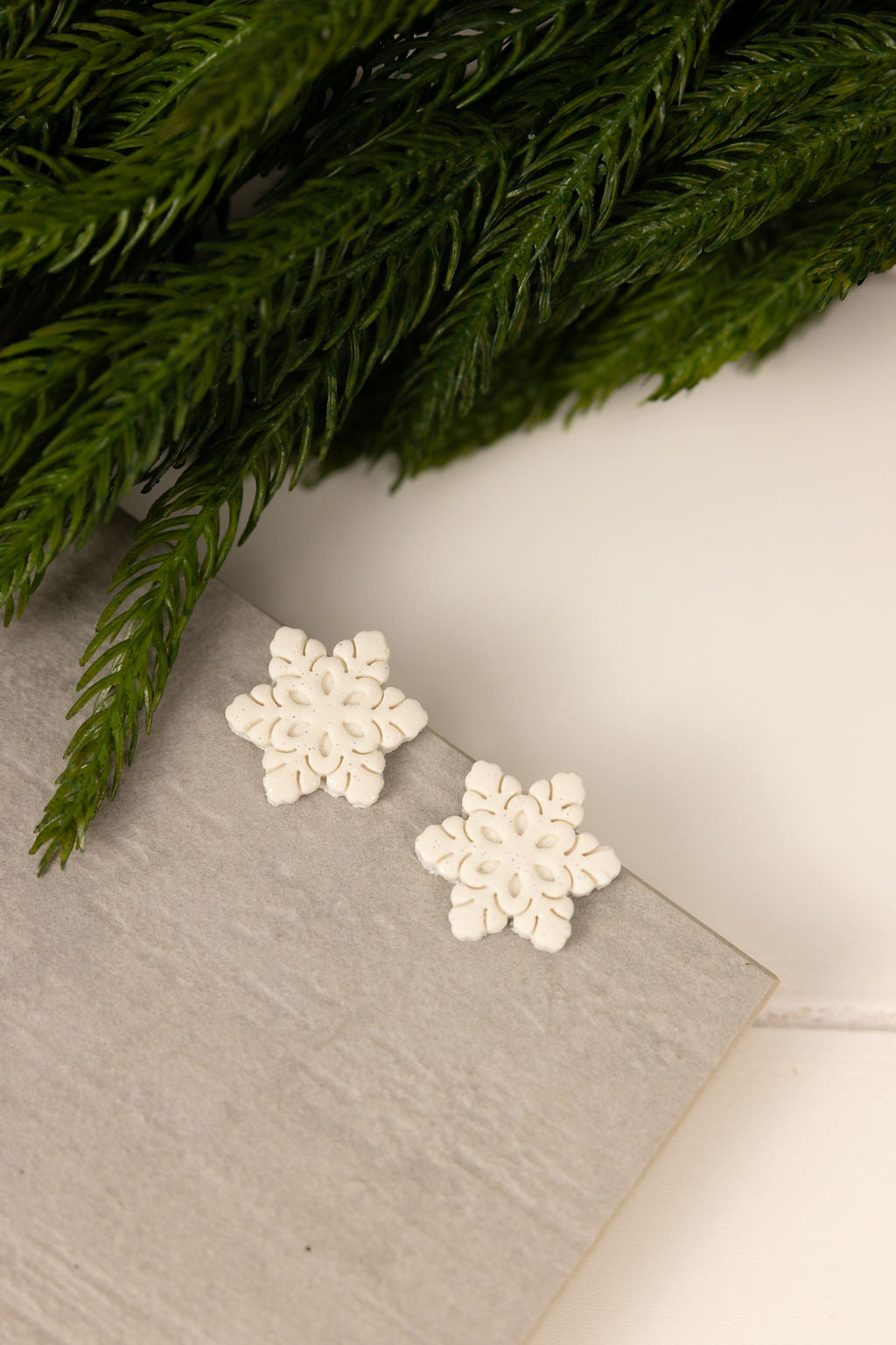 Polymer clay white snowflake stud earrings