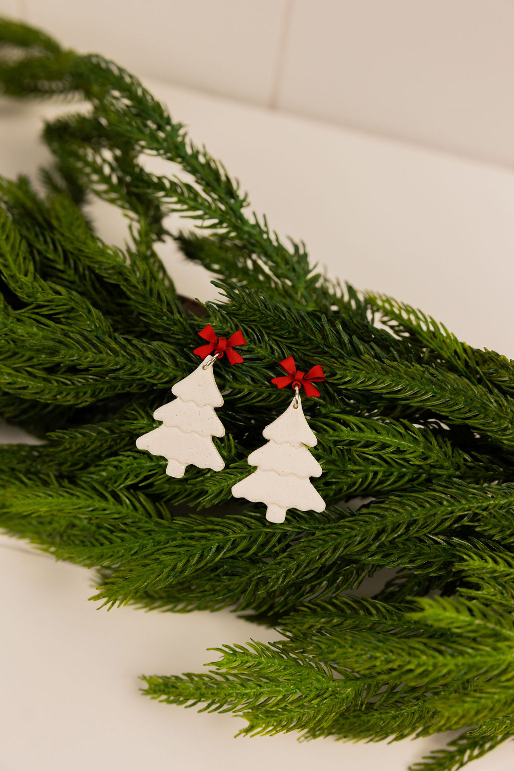 White polymer caly christmas tree earrings