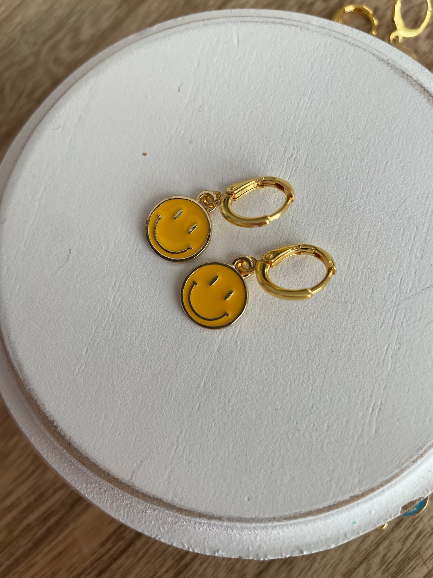 gold charm earrings | smiley face