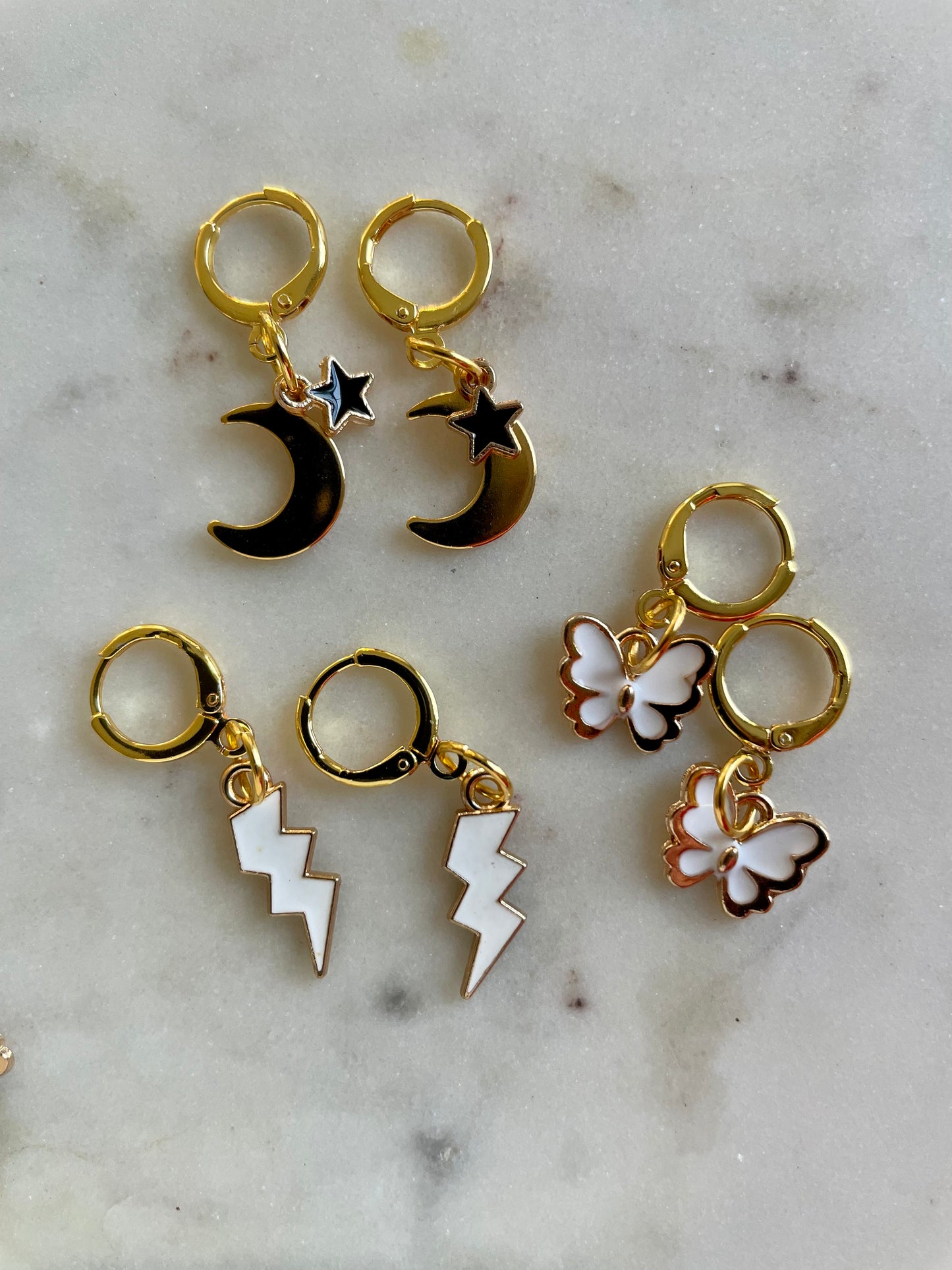 gold charm earrings | lightening bolt